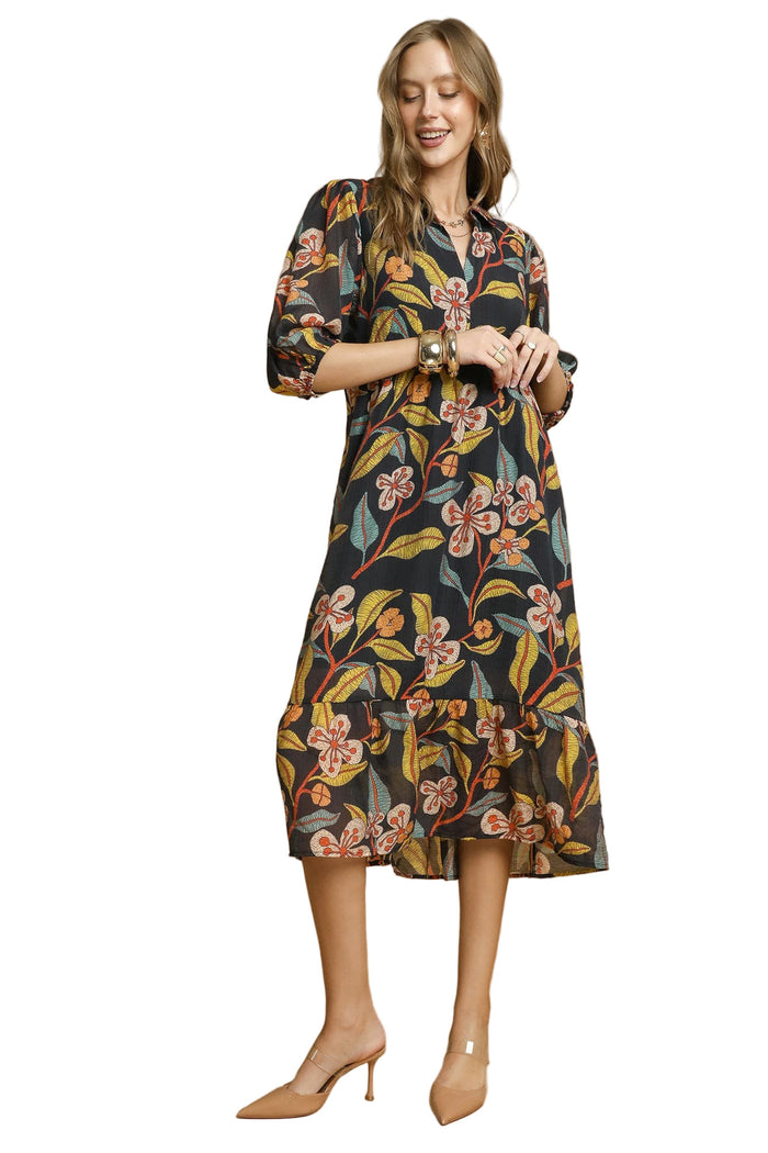 Woman wearing a floral dress on a white background