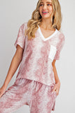 143 story snake printed pocket top