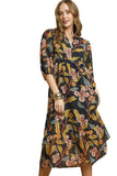 Woman wearing a floral dress against a background