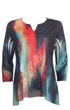 Colorful abstract patterned top on a white background