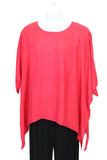 Red dolman-sleeve top on a mannequin against a white background
