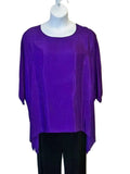 Purple top on a mannequin against a plain background