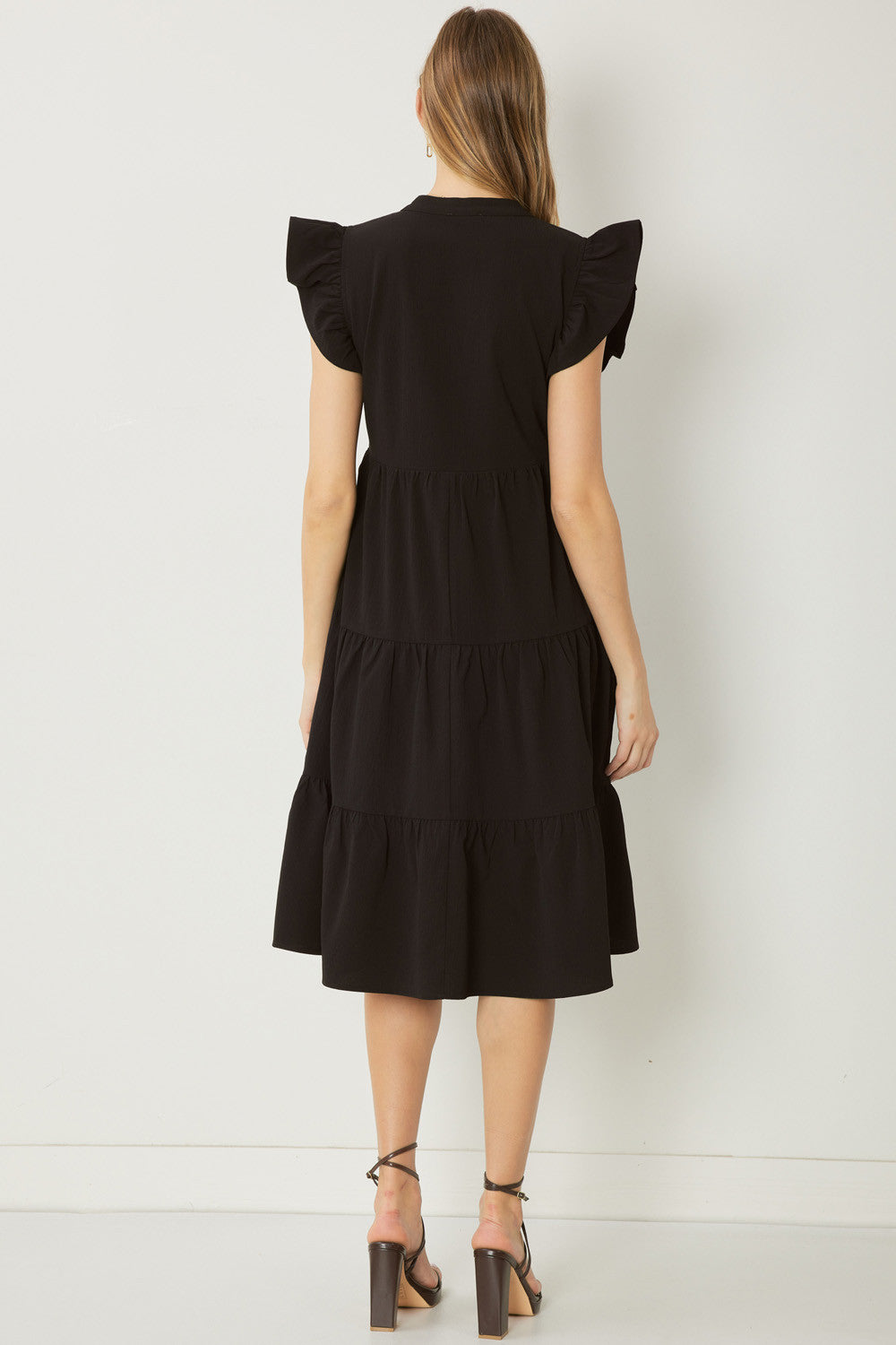 entro black dress Wrap-Style Side Tie Midi 100% Polyester Imported Model is wearing a size SmallModels Profile Ruffled Tiered Pocket Midi Dresses